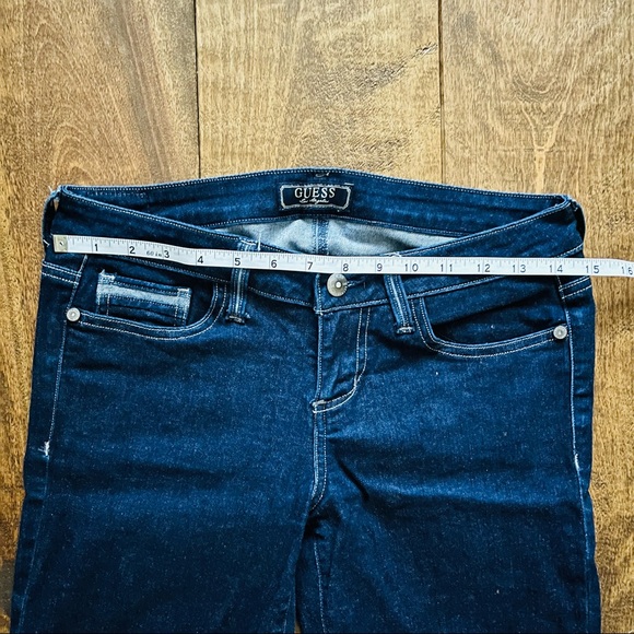 Guess Low-Rise Skinny Dark Wash Jeans with Rhinestone Heart on Back Pocket - Picture 10 of 12